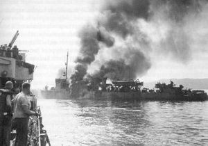 USS Ward burning